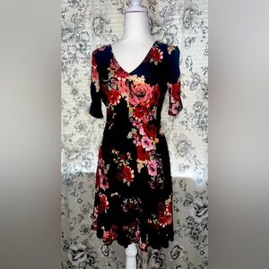 Maurices dress. NWT. Size X-small. Black with bold pink floral.